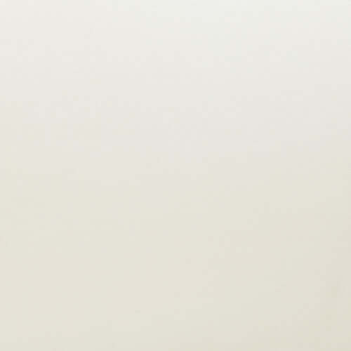 Close-up of a soft, textured fabric in a light cream color for upholstery.
