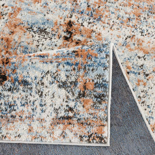 Abstract multi-color area rug showcasing vibrant textures and patterns, ideal for modern living spaces.