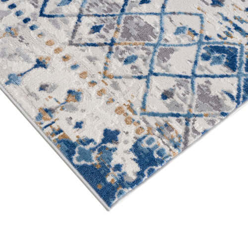 Moroccan styled woven area rug with blue and beige tones, featuring intricate patterns and plush texture.