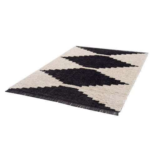 Black and ivory modern diamond design area rug, 6'x9', stylish addition to contemporary home decor.