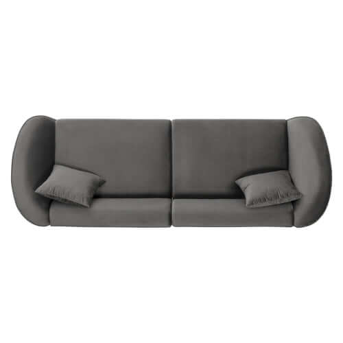 Contemporary sloped arm bouclé upholstered sofa with pillows, showcasing a sculptural curved design in dark gray.