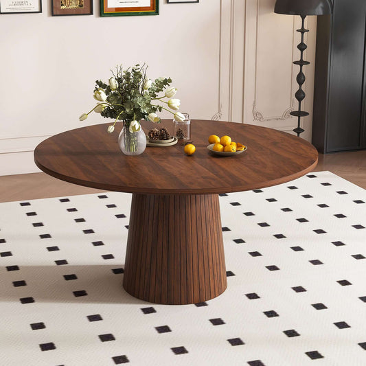 47-Inch Round Walnut Dining Table for 4 – Modern Farmhouse Kitchen Table with Wood Strip Base, featuring floral arrangement and decor.