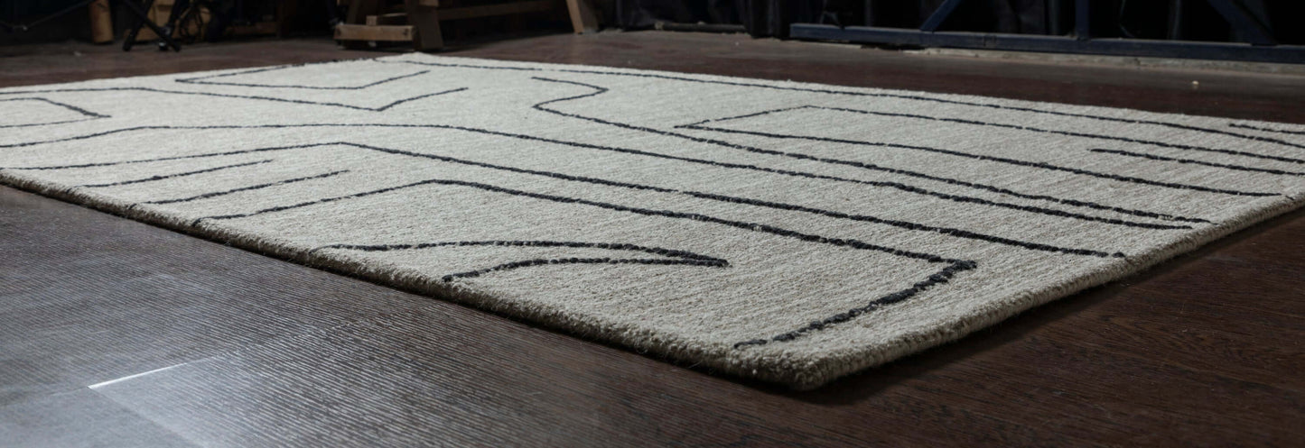 Abbey Valetta rectangular handwoven wool area rug with abstract design in neutral tones, enhancing modern interiors.