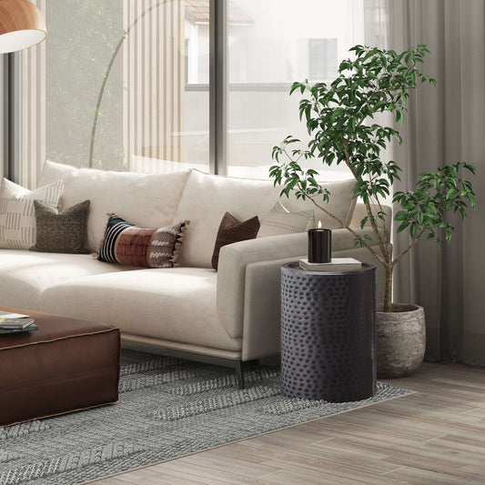 Corbin Hammered Antique Metal Cylindrical Side Table in rich antique copper finish, showcasing a hand-hammered texture.