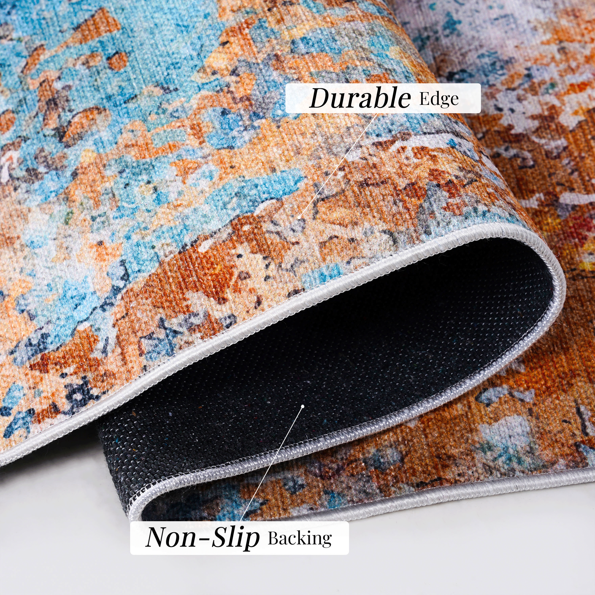 Close-up of multi-colored abstract area rug showcasing durable edge and non-slip backing for added safety.