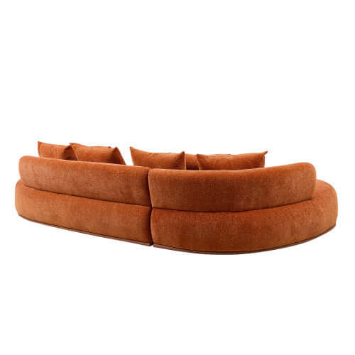 Rounded L-Shaped chaise sofa sectional in orange, featuring plush cushions and modern design for comfortable lounging.