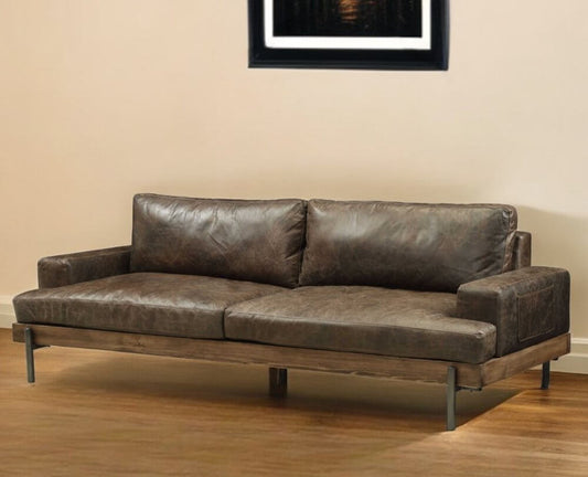 95" Chocolate Top Grain Leather Sofa with Black Legs | Modern Leather Couch in a contemporary living room setting.