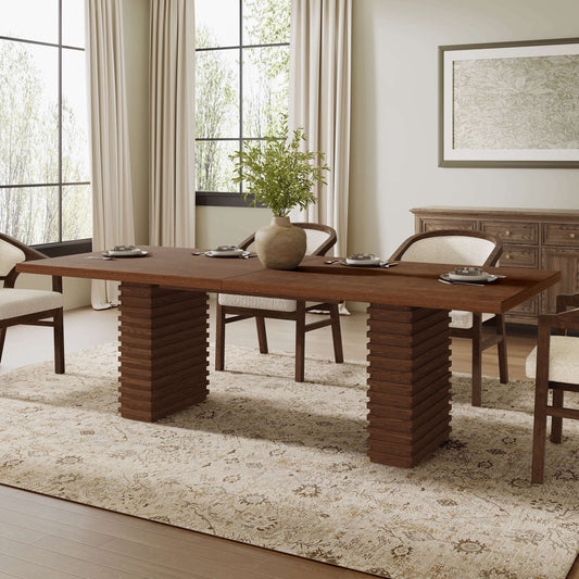 95-Inch Modern Walnut Dining Table for 8 with sculptural base in a spacious dining room setting.