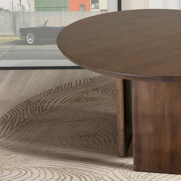 Alden Round Solid Walnut Wood Dining Table with Pedestal Base on patterned rug
