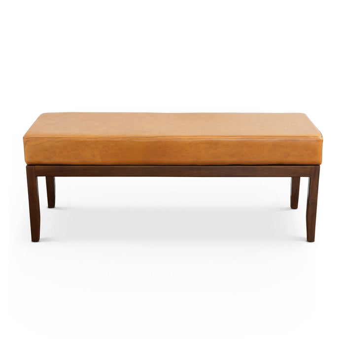 The Ashcroft Furniture Austin MCM Genuine Leather Bench 51 features light brown leather upholstery and dark wooden legs, displayed against a white background.