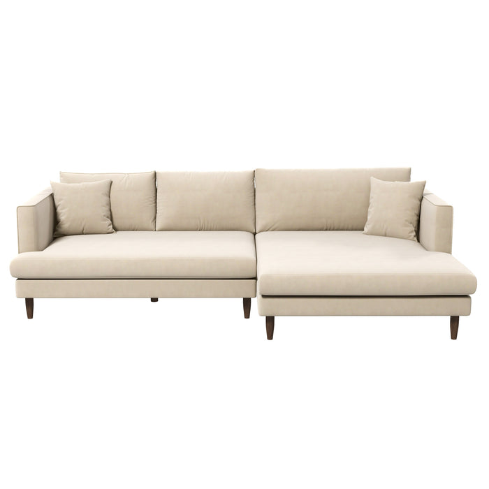 The Ashcroft Furniture Blake Velvet Upholstered L-Shape Chaise Sofa Sectional 107 features plush beige velvet, wooden legs, three seat cushions, five matching pillows, and a right-side extended chaise, shown against a white background.