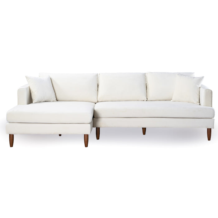 The Ashcroft Furniture Blake Velvet Upholstered L-Shape Chaise Sofa Sectional 107 features plush velvet, wooden legs, four back cushions, and a left-side chaise lounge, shown against a plain white background.