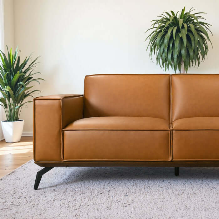 Brenham MCM Right-Facing Chaise Sofa Sectional in cognac vegan leather, enhancing mid-century modern living room decor.