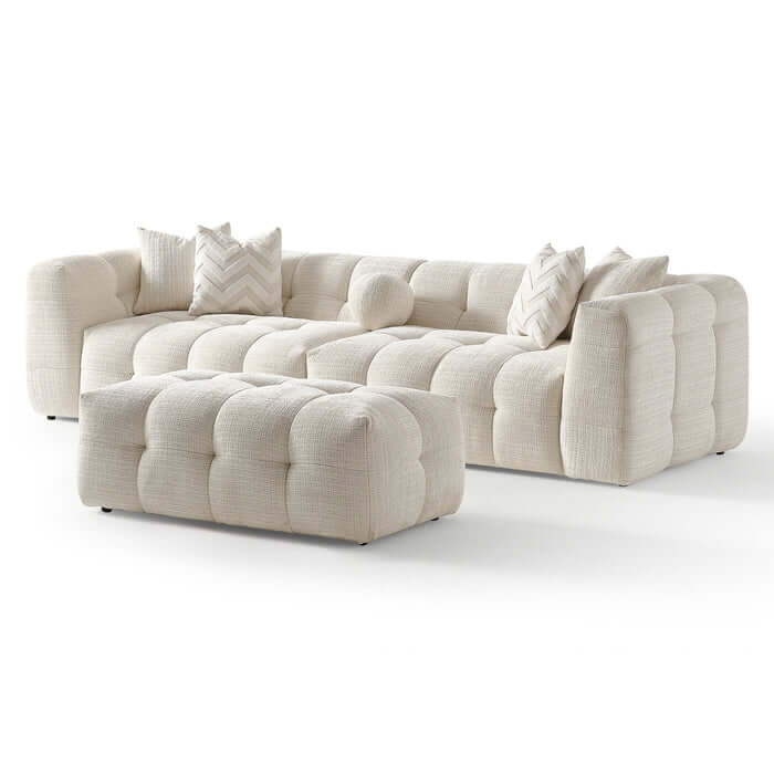 Alana Tufted Ivory Chenille Modular Sofa with Ottoman showcasing plush tufted design and cozy pillows.