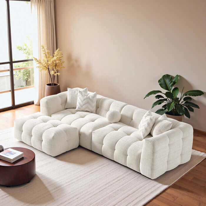 Alana Tufted Ivory Chenille Modular Sofa with Ottoman, showcasing cozy design and modern living room aesthetics.
