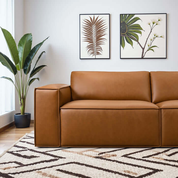 Uvalde MCM Vegan Leather Wide-Arm Sofa 92" in rich cognac color, showcasing mid-century modern design and contemporary comfort.