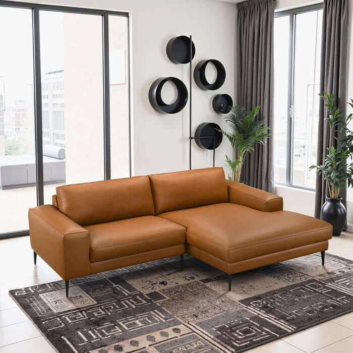 Easley MCM Vegan Leather Wide-Arm Chaise Sofa in modern living room setting with natural light.