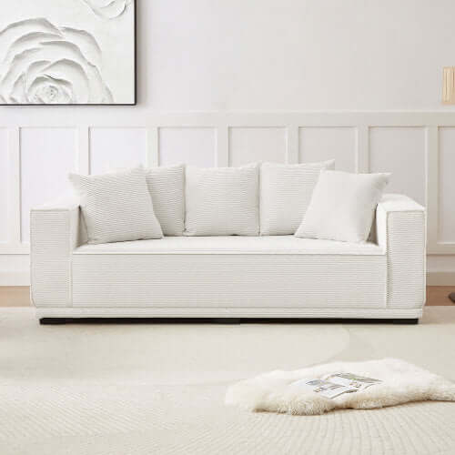 MCM Box Arm Corduroy Upholstered Sofa 89" in white with plush pillows, showcasing mid-century design and cozy comfort.