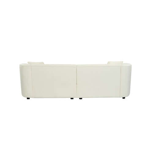 Back view of a contemporary sloped arm boucle upholstered sofa in white color, showcasing its sleek design.
