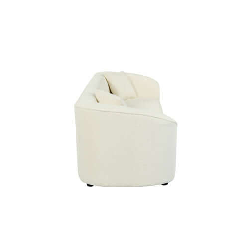 Contemporary sloped arm boucle upholstered sofa in off-white, showcasing its sculptural curved design and plush upholstery.