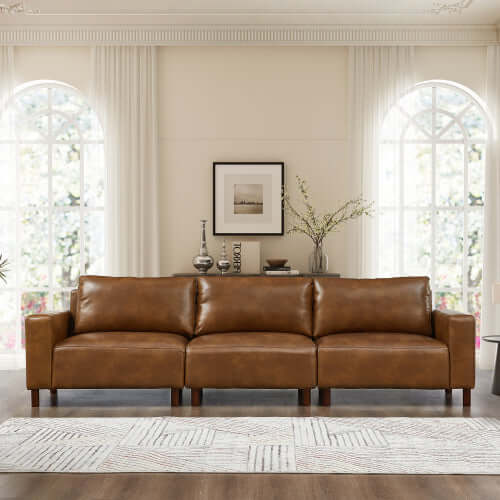Luxury PU Leather Sofa 112" – Modern Faux Leather 3-Seat Couch with Wood Legs (3 Colors) in a stylish living room setting.
