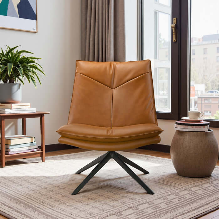 Oakland Cognac Vegan Leather Armless Swivel Chair in modern living room setting, featuring X-shape pedestal base.