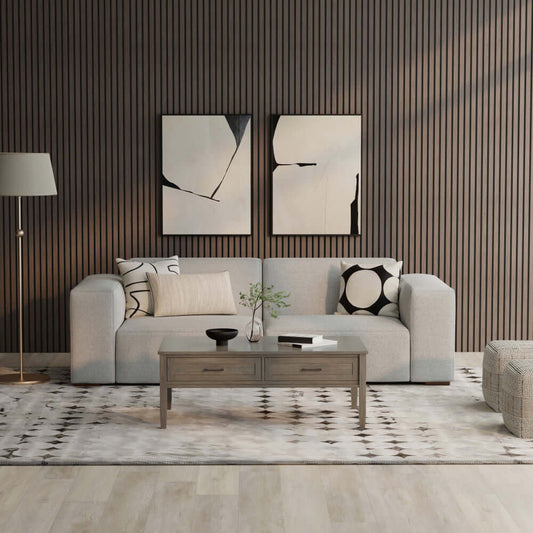 Rex Contemporary Boxy Silhoette Sofa (2 Sizes) in a modern living room with artistic decor and a stylish coffee table.