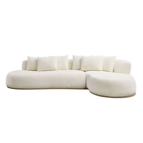 Modern rounded L-shaped chaise sofa sectional in cream with plush cushions, perfect for lounging and stylish living spaces.