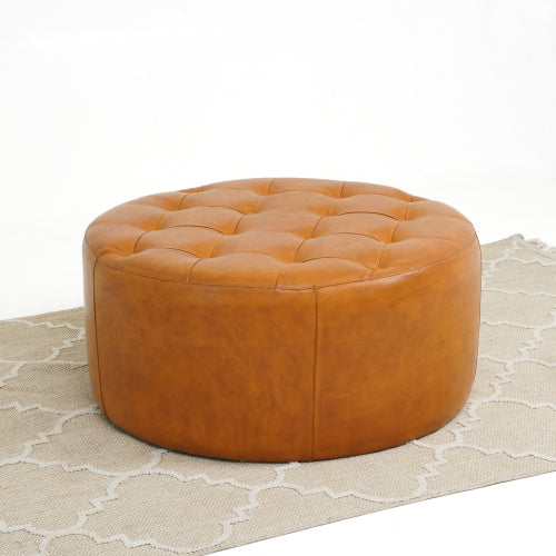 Seletar Round Button Tufted Leather Ottoman – 37” Genuine Leather Ottoman (MCM Style, Multi-Functional) on a rug.