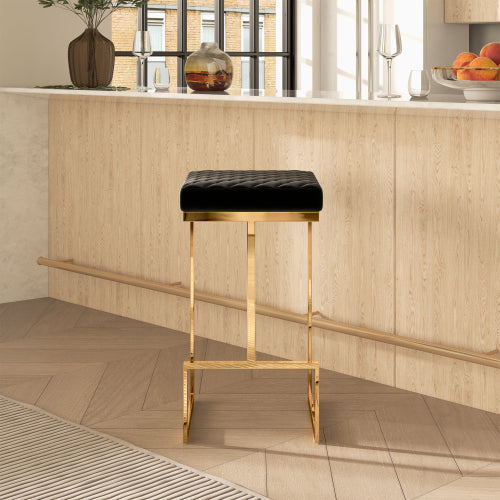 Joel Gold Velvet Bar Stool – Upholstered Backless Counter Stool with Metal Frame (Modern Glam Style) in black and gold.