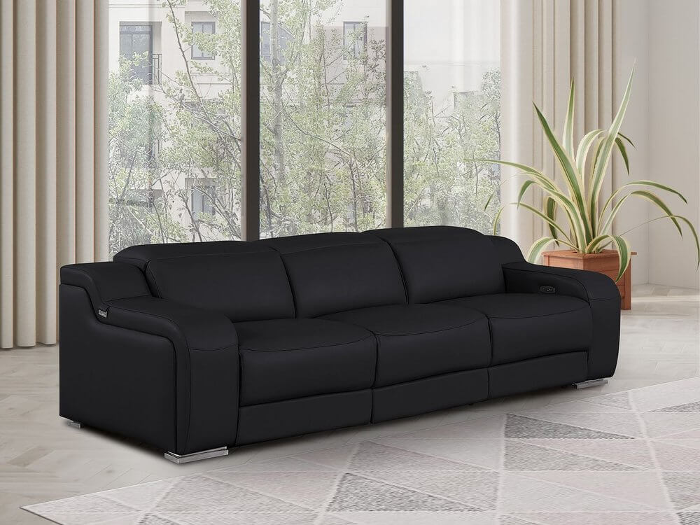 103" Italian Leather Reclining USB Sofa | Power Recliner Couch in modern living room setting with large windows.