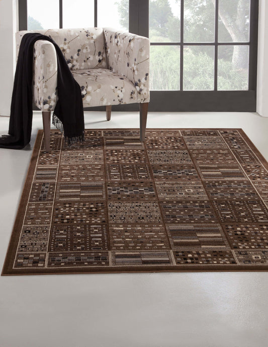 Drexel Chocolate Viscose Area Rug 8x10 displayed in a stylish living room setting with a patterned armchair.