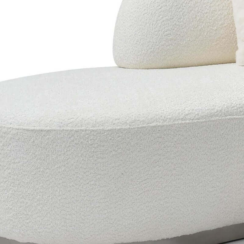 Close-up of the 150" Boucle Curved Sofa with Toss Pillows – Modern Armless Design showcasing its soft boucle fabric.