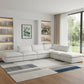 160" White Linen Blend Modular Armless Sofa With Ottomans And Storage in a modern living room setup.