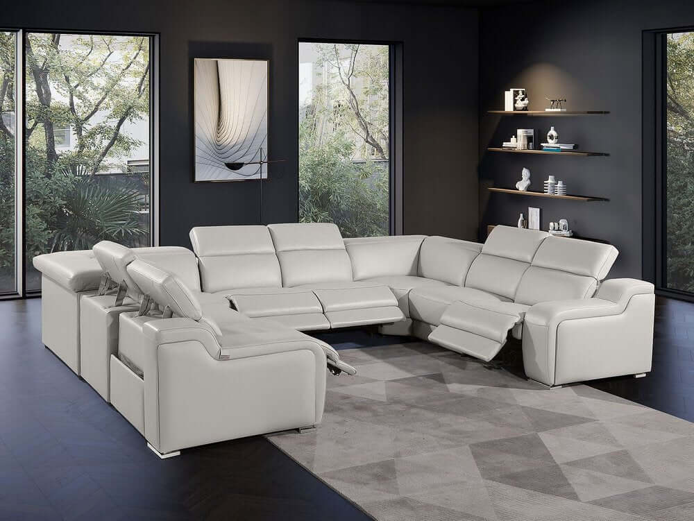 Light Gray Italian Leather Power Reclining U Shaped Eight Piece Corner Sectional With Console in modern living room.