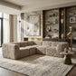 Cavell Faux Fur L-Sectional Sofa styled in a contemporary living room