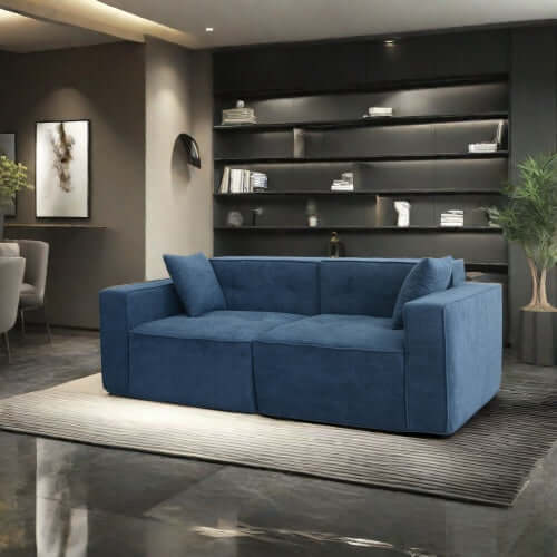 Modern low profile box arm memory foam sofa in blue, elevating living room style and comfort.