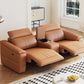 2-seat modular leather recliner sofa with cup holders in a stylish living room setting.