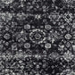 Distressed vintage Persian styled woven area rug with a dark color palette, measuring 8x10ft, perfect for elegant home decor.