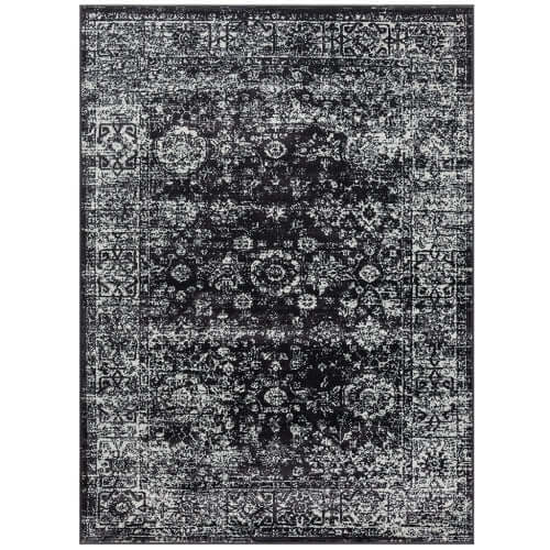 Distressed vintage Persian styled woven area rug in dark tones, 8x10ft, perfect for adding elegance to living spaces.