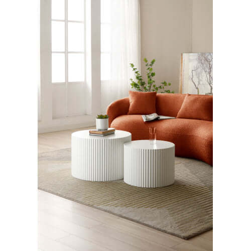 Modern Boucle Curved Sofa 94" – Sculptural 3-Seater Upholstered Couch (4 Colors) paired with white ribbed side tables.