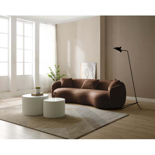 Modern Boucle Curved Sofa 94" – Sculptural 3-Seater Upholstered Couch (4 Colors) in a stylish living room setting.
