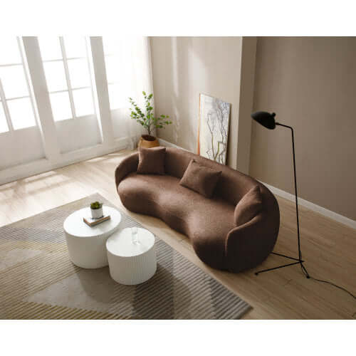 Modern Boucle Curved Sofa 94" – Sculptural 3-Seater Upholstered Couch (4 Colors) in a stylish living room setting.