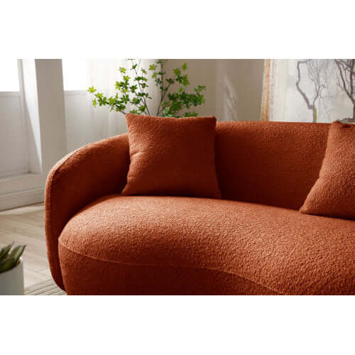 Modern Boucle Curved Sofa 94" – Sculptural 3-Seater Upholstered Couch (4 Colors) in rust color with plush texture.