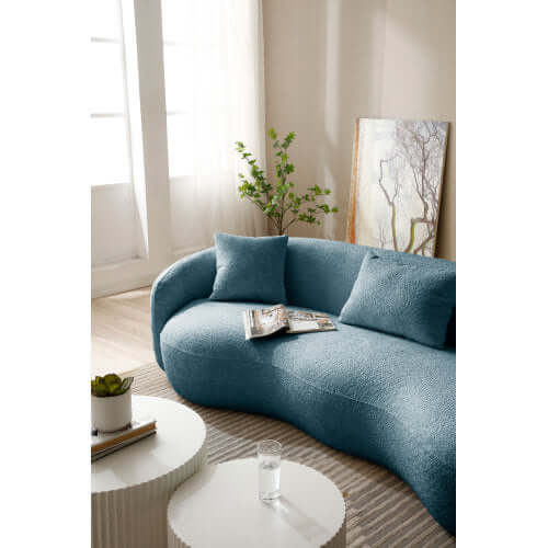 Modern Boucle Curved Sofa 94" – Sculptural 3-Seater Upholstered Couch (4 Colors) in light blue fabric.