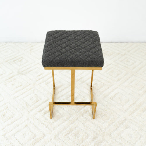 Joel Gold Velvet Bar Stool – Upholstered Backless Counter Stool with Metal Frame (Modern Glam Style) featuring a quilted seat.