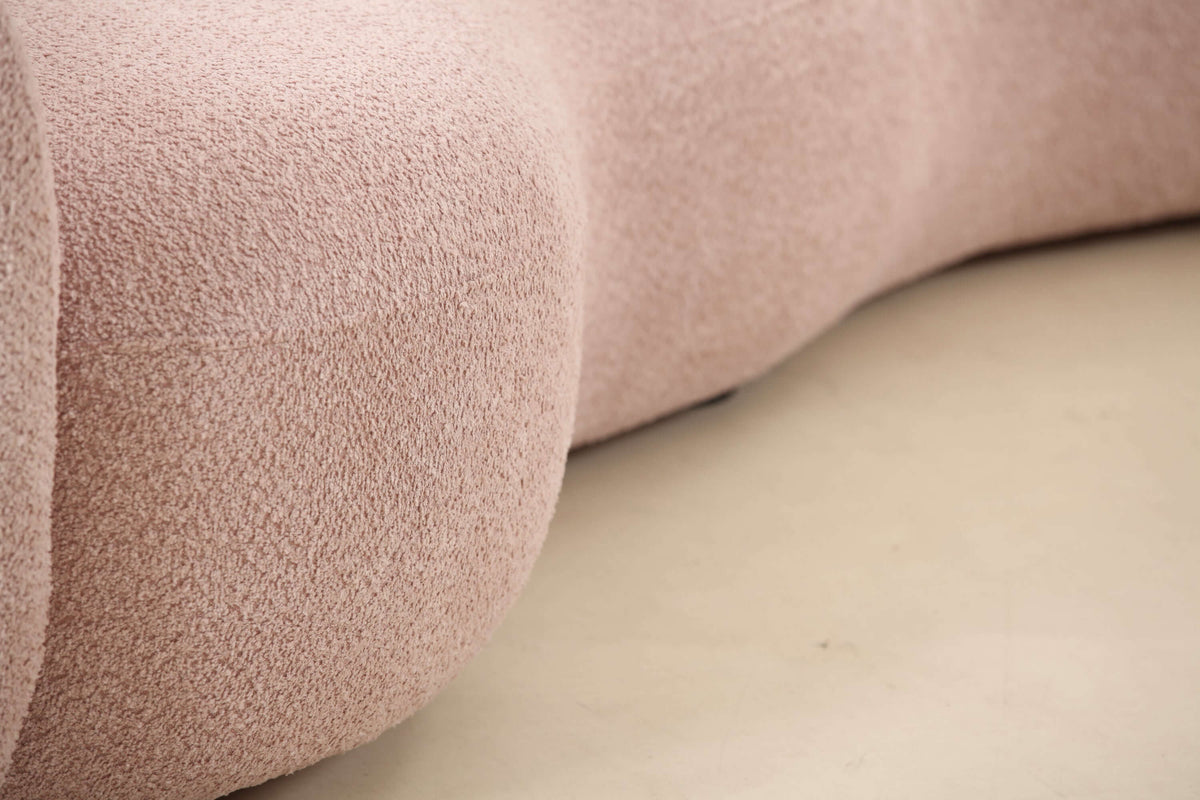 Close-up of the Modern Boucle Curved Sofa 94" – Sculptural 3-Seater Upholstered Couch (4 Colors) in soft boucle texture.