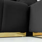 Close-up of Nolan Tufted Velvet U-Shape Sectional featuring black fabric and sleek gold legs.