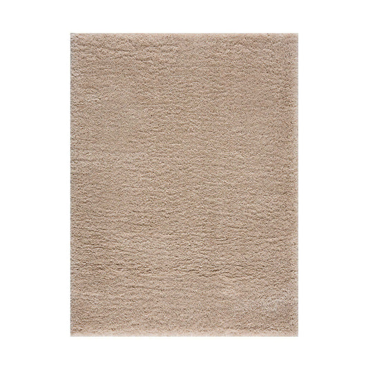 Super soft rectangular beige polyester shag area rug, perfect for cozy living rooms or bedrooms.