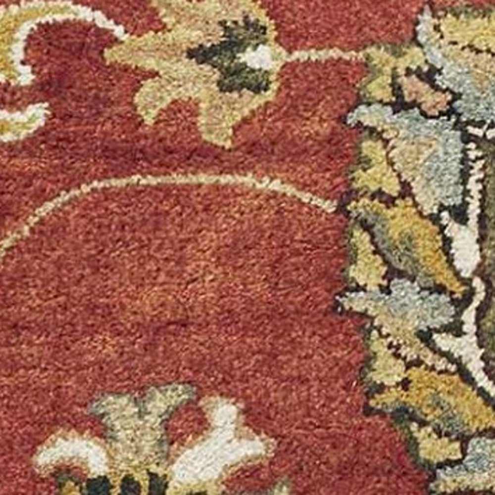 Sienna Gold And Green Wool Floral Vines Hand Tufted Area Rug | 9' x 13' close-up detail of floral design.